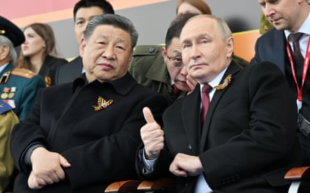 Xi Jinping and Vladimir Putin sitting side by side