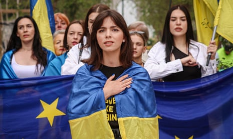 Supporters of Ukraine and Georgia carrying an EU flag in Brussels in June.