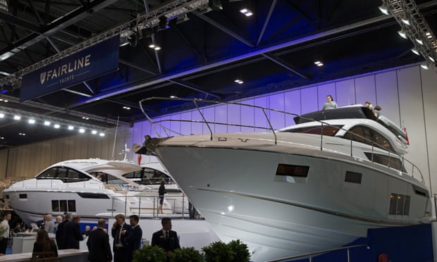 Visitors to the Fairline luxury yacht stand at the 2017 London Boat Show.
