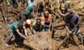 Locals dig in search of survivors and bodies. Survivors have been hesitant to allow heavy machinery to be used in rescue efforts, because they do not want the bodies of their relatives harmed.