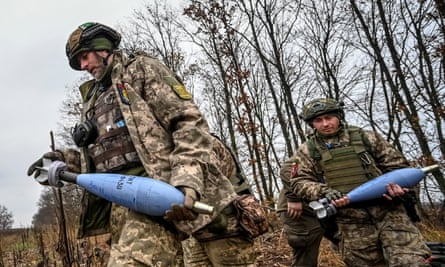 Ukrainian servicemen prepare to fire a mortars on a front line in the Zaporizhzhia region, Ukraine, 16 November 2022.