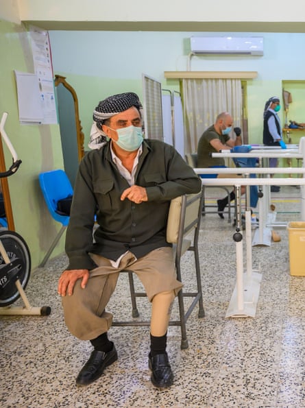 A man wearing prosthetic leg in the Red Cross rehabilitation centre, Erbil, Kurdistan, northern Iraq.