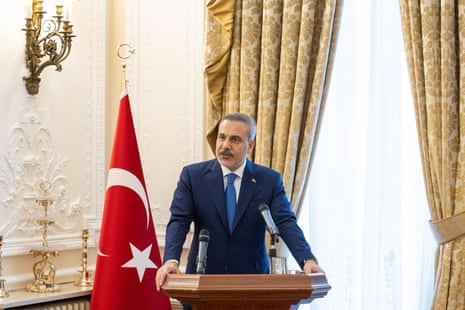 Turkey’s foreign minister, Hakan Fidan, delivering a speech at a meeting.