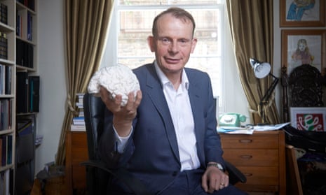 Andrew Marr holding his own 3D printed brain.