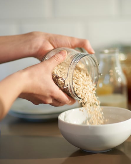 Pouring oats into a bowl