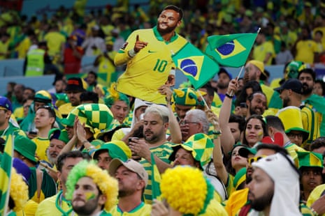 Brazil fans display a cardboard cutout of Neymar and are generally having a lovely old time.