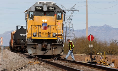 Crew on a Union Pacific freight train works at a siding area on January 2020, south of Tucson, Arizona.