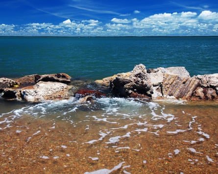 February 2011 picture of the tide coming over a defence wall at Sabai Island in the Torres Strait.
