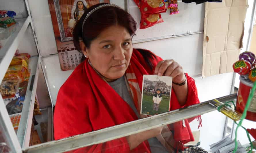 Rosa Rojas Borda with a picture of her late son Javier, who was killed by a paramilitary death squad when he was eight years old.