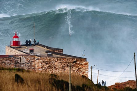 Garrett McNamara riding what everyone called the “100-foot wave”, likely the world’s biggest wave ever surfed, at Praia do Norte, Nazaré, Portugal