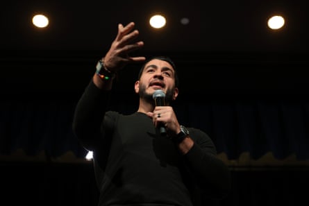 a man holding a microphone
