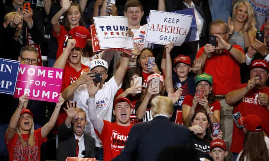 President Donald Trump greets the crowd during a campaign rally Friday, Sept. 21, 2018, in Springfield, Mo. (AP Photo/Charlie Riedel)