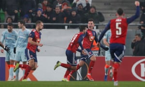Roland Juhasz celebrates with teammates after Ethan Ampadu’s own goal put Vidi back on level terms.