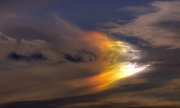 Miracle? A sun dog, caused by clouds of ice crystals at high altitude.