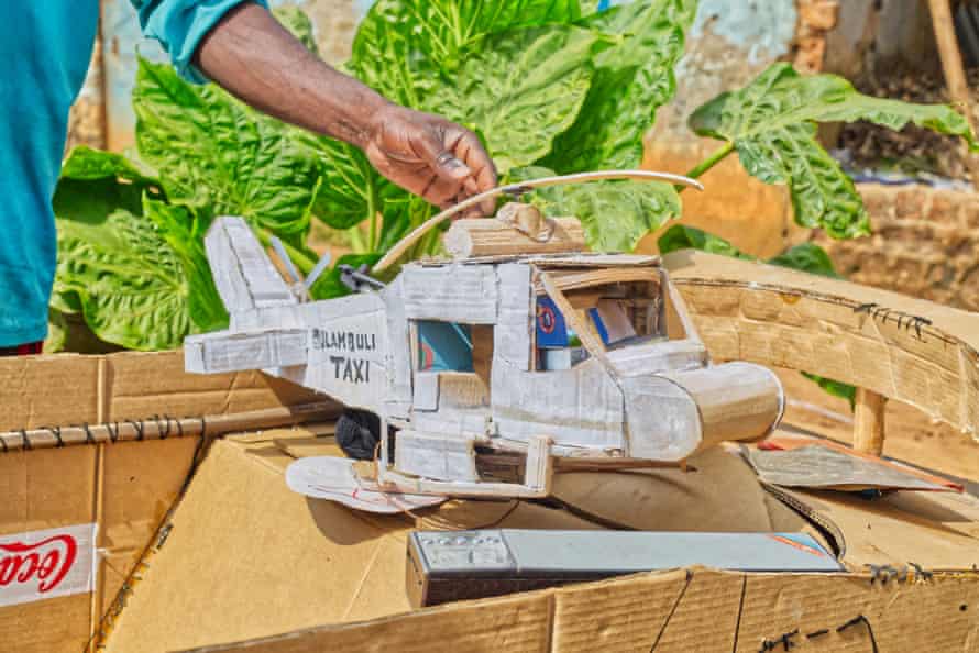 A cardboard helicopter, behind the scenes on the Money Makes Money video