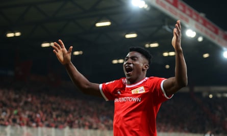 Taiwo Awoniyi celebrates after scoring for Union Berlin against Köln in April 2022.