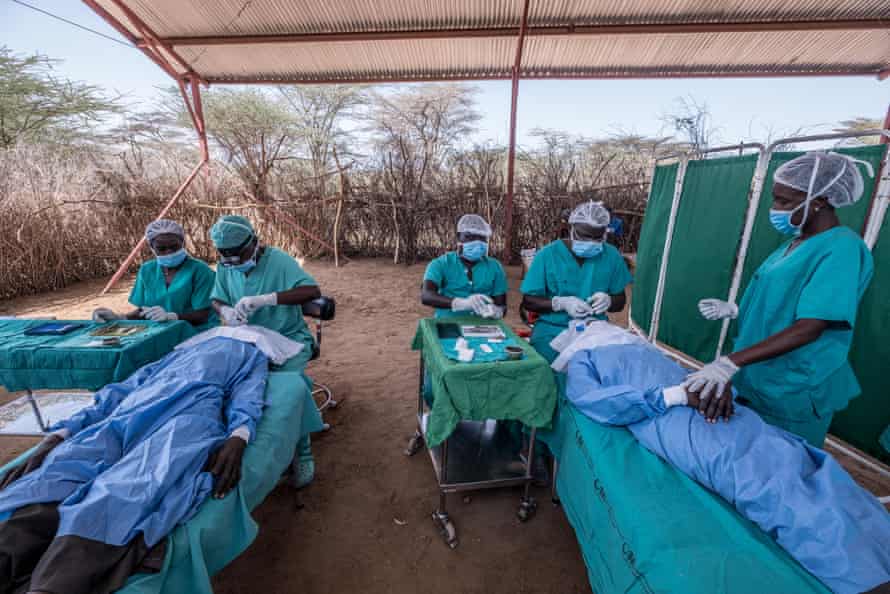 Surgeons perform trachoma operations at a makeshift operating theatre in a remote area of Turkana, Kenya