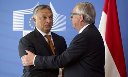 European Commission President Jean-Claude Juncker, right, greets Hungarian prime minister Viktor Orbán before a meeting in Brussels about the migration crisis.