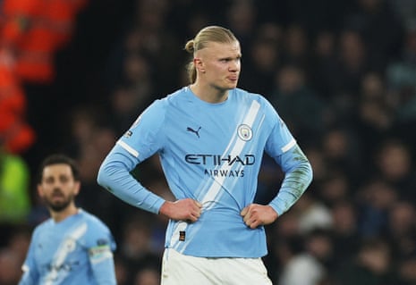 Manchester City's Erling Haaland looks dejected after Nottingham Forest's Elliot Anderson scored their second goal.