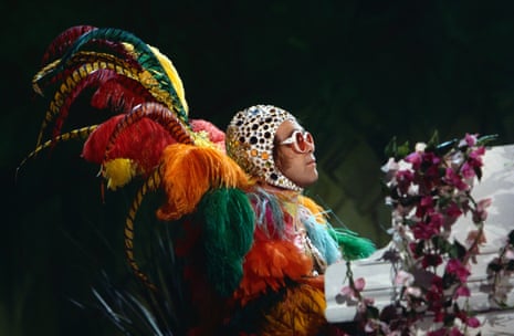 ‘I’ve never been very comfortable with seeing myself on a big screen’: Elton John performs on the Muppet Show, Elstree Studios, UK.