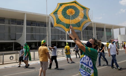 A Bolsonaro supporter outside the presidential palace