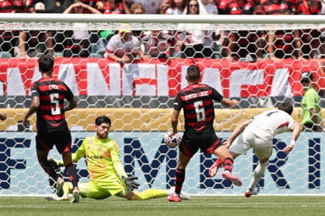 Pedro Neto races clear to open the scoring for Chelsea.