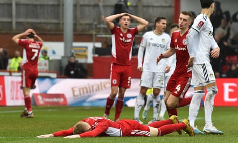 Accrington Stanley's defender Harvey Rodgers lays on the pitch as he reacts after failing to score.