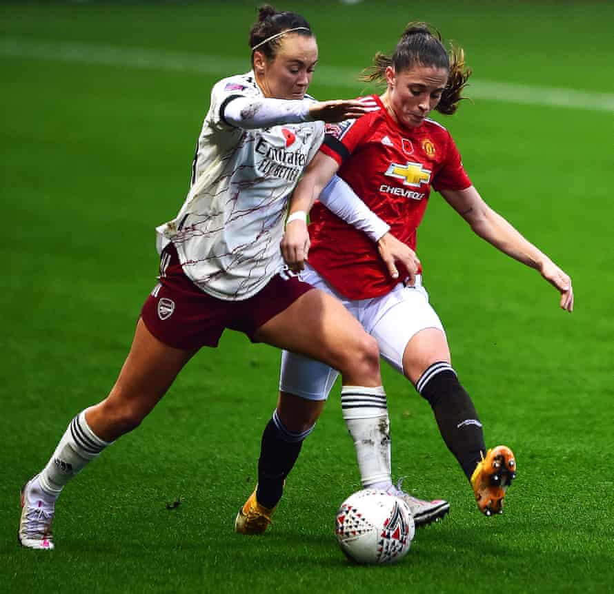 Manchester United’s Ona Batlle (right) tussles with Arsenal’s Caitlin Foord during their Women’s Super League match at Leigh Sports Village in November 2020.