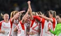 Pernille Harder celebrates with teammates after scoring against VfL Wolfsburg on 23 March