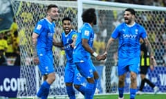 Yasser Al-Shahrani, centre, celebrates scoring Al-Hilal’s first goal against Al-Ittihad on Tuesday night.