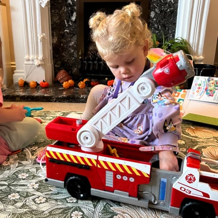 A child plays with the Paw Patrol fire rescue truck