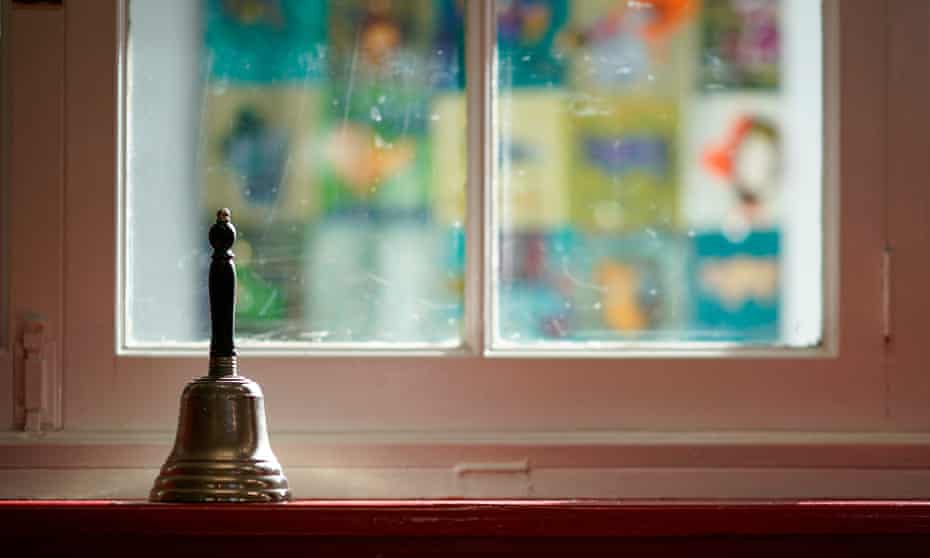  The school bell sits dormant on a window sill