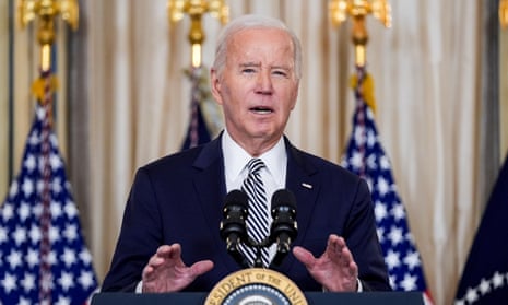 President Joe Biden speaks during a meeting in the State Dining Room of the White House on Monday.