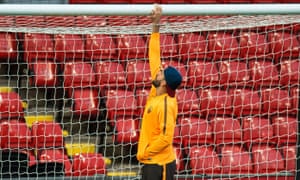 Roma’s goalkeeper Alisson checks out the crossbar at Anfield