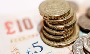 Family saving pots reportFile photo dated 29/01/17 of a pile of one pound coins placed on five pound and ten pound banknotes. Nearly half of families with dependent children could not keep up their current lifestyle for a month if the main breadwinner was unable to work, a report has found. PRESS ASSOCIATION Photo. Issue date: Wednesday March 22, 2017. See PA story MONEY Families. Photo credit should read: Yui Mok/PA Wire