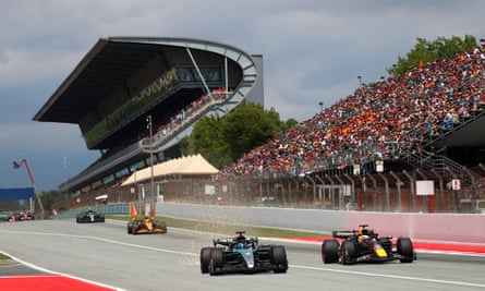 George Russell and Max Verstappen race during the F1 Grand Prix of Spain.