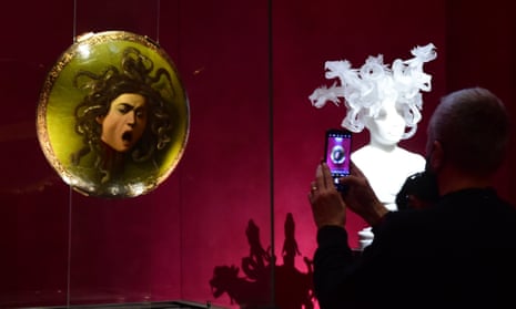 Medusa by Belgian artist Koen Vanmechelen on display next to Caravaggio’s Medusa at the Uffizi