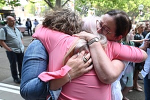 Women embrace after the ruling handed down in November 2019.