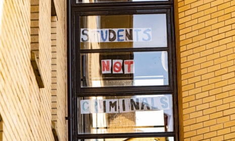 Students self-isolating inside their halls of residence in Glasgow post messages on the windows. 