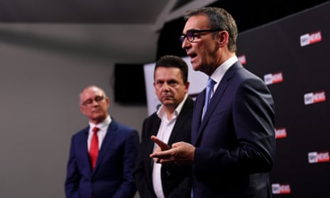 Liberal leader Steven Marshall (right), SA Best leader Nick Xenophon and Labor premier Jay Weatherill fighting for every last vote in the South Australian election.