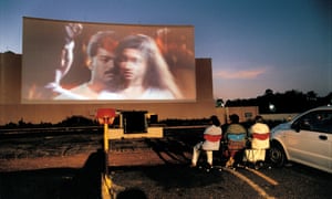People watch a film at drive-in cinema in Chennai, southern India