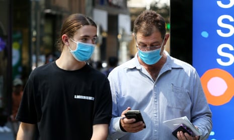 Public health experts have called for restrictions, such as masks and density limits, to combat the spread of the Omicron Covid variant