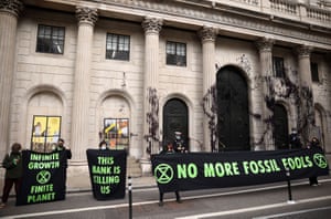 Extinction Rebellion activists protest outside the Bank of EnglandActivists from the Extinction Rebellion, a global environmental movement, protest outside the Bank of England, in London, Britain, April 1, 2021. REUTERS/Henry Nicholls