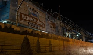 Farmer John, a slaughterhouse in the city of Vernon, Los Angeles, CA, is well known for its bright, colorful murals depicting happy pigs roaming free on pastures. The mural was painted by an unemployed Warner Bros set designer named Les Grimes back in 1957, and has remained, in various permutations, up until this day.