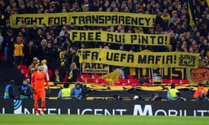 Borussia Dortmund fans hold up a message in support of Rui Pinto during the Champions League round of 16 first leg match against Tottenham Hotspur at Wembley Stadium in February 2019.