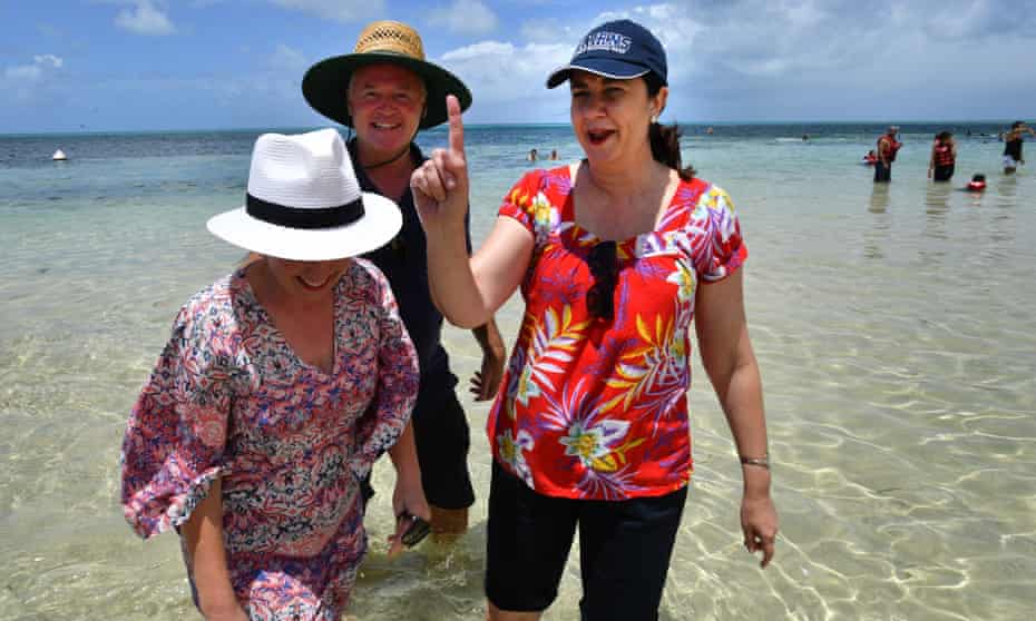 ueensland Premier Annastacia Palaszczuk (right), ALP candidate for Cairns, Michael Healy (centre) and Minister for Tourism, Major Events and the Commonwealth Games, Kate Jones (left) are seen on Green Island, which lies in the Great Barrier Reef, off the coast of Cairns, Tuesday, November 14, 2017. Premier Palaszczuk is campaigning in the Cairns area which is home to four must win electorates. (AAP Image/Darren England) NO ARCHIVING