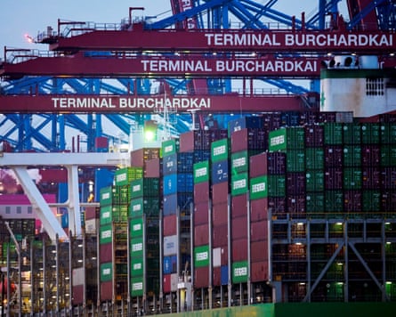 A Panama-flagged container ship is seen at the loading terminal “Burchardkai”, in the port of Hamburg, Germany