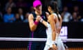Emma Raducanu shakes hands with Iga Swiatek after Swiatek beat her at the Stuttgart Open