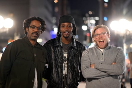 Romesh Ranganathan, left, and Rob Beckett, with, centre, the US producer and rapper CJ Fly.