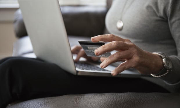 Woman with laptop and credit card